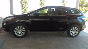 Mazda CX negra, 4 cil, equipada