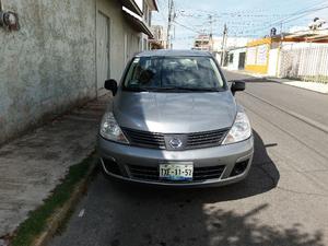 Nissan Tiida todo pagado.