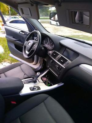 Se vende camioneta BMW X color gris único dueño