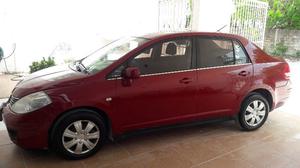 Nissan Tilda modelo , color rojo, aire acondicionado,