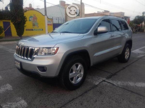 Grand cherokee piel 6 cilindros impecable