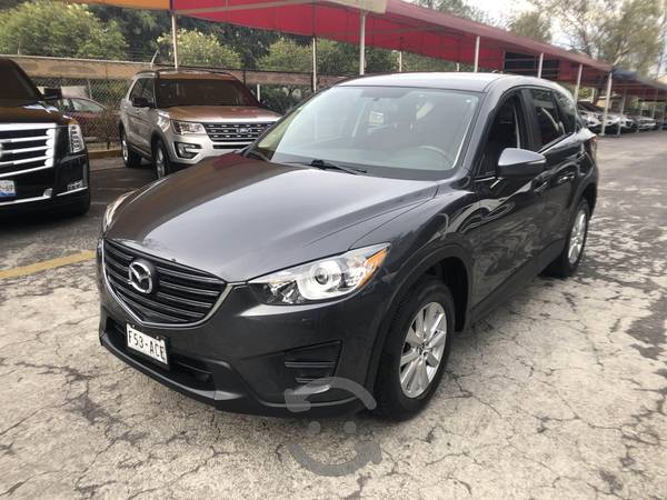 ¡Mazda CX5 2.0 impecable!