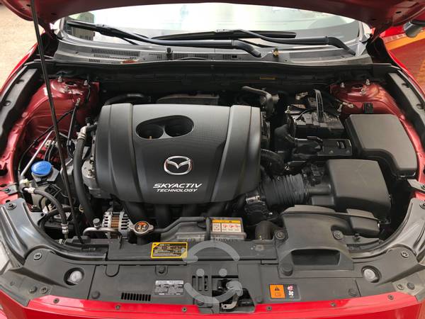 Mazda 3 Super Grand Touring Automático  rojo en Álvaro